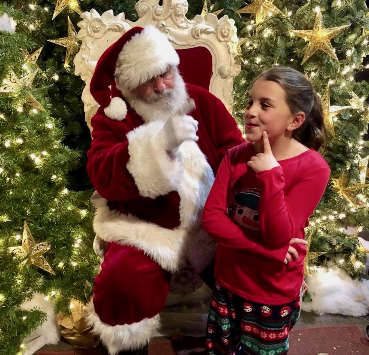 Lily as a young child with Jennifer at a pumpkin patch